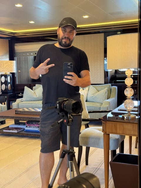 Camera set up on a tripod in a yacht saloon