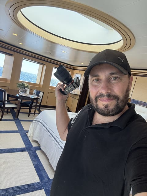 Photographer on board with a camera rig