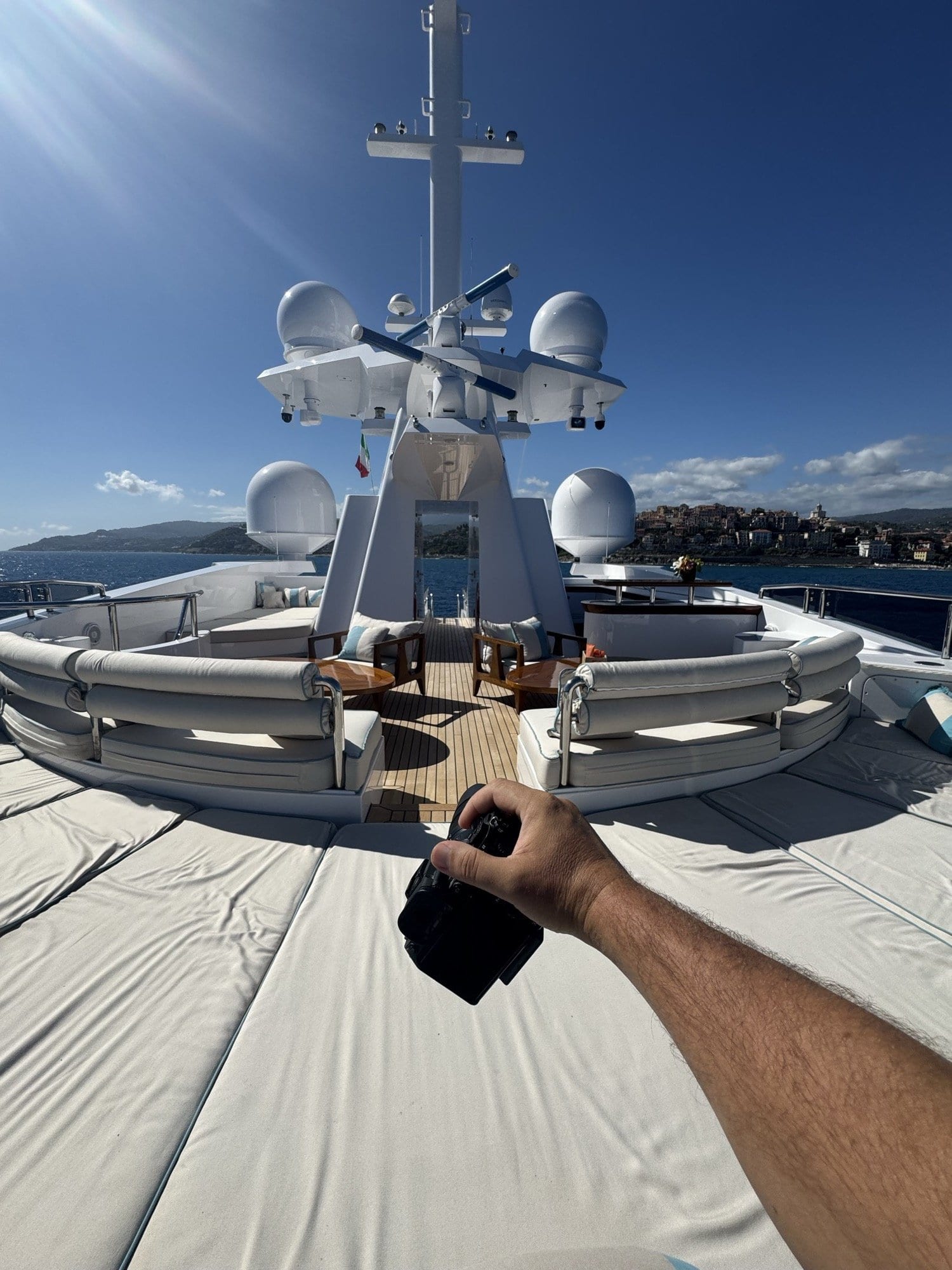 Drone launched from a yacht sundeck during a photo shoot