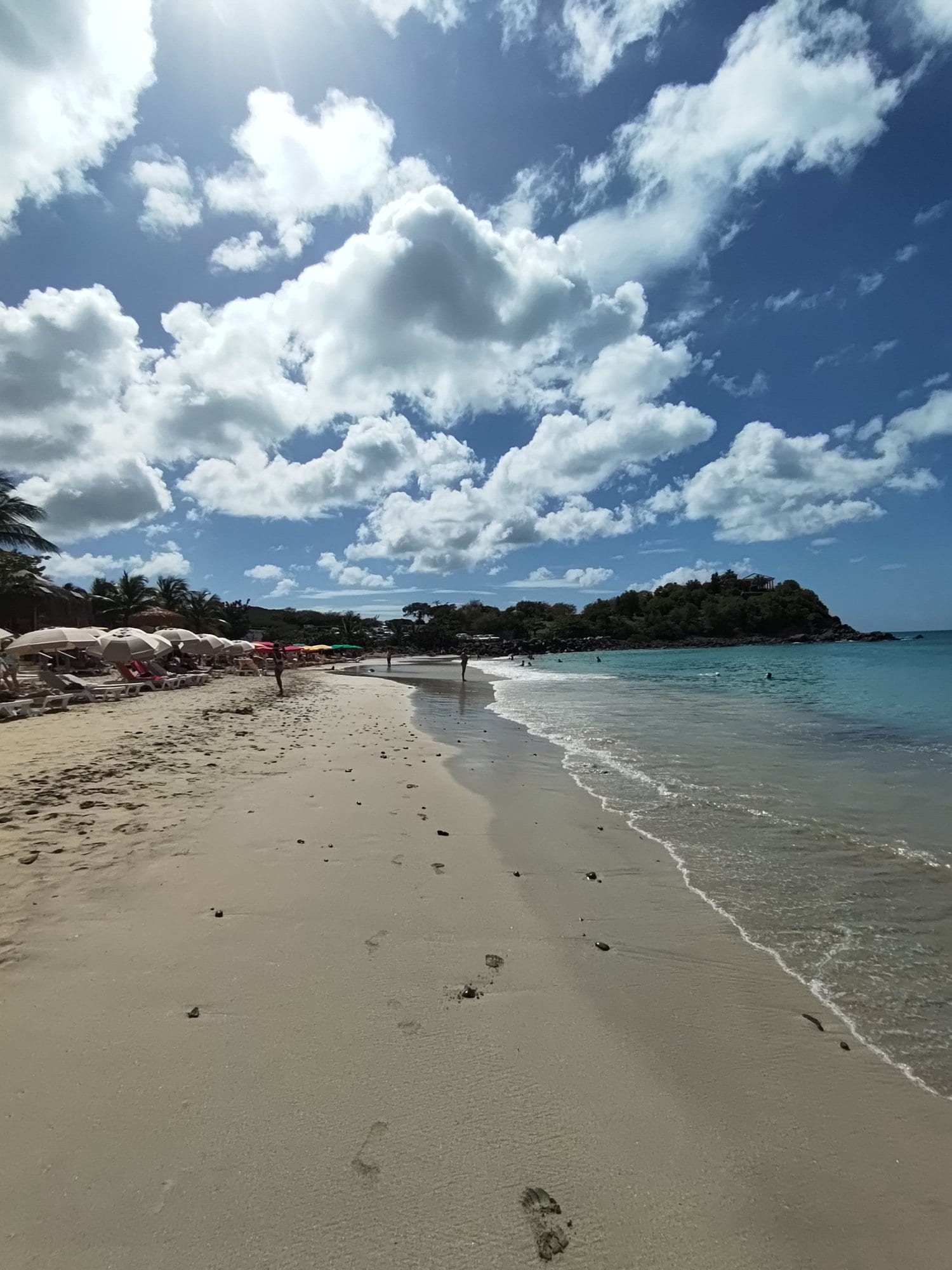 Empty white sand beach and turquoise shallows on St Maarten