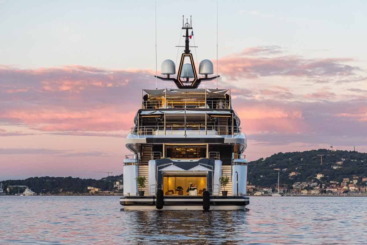 Superyacht at anchor at sunset