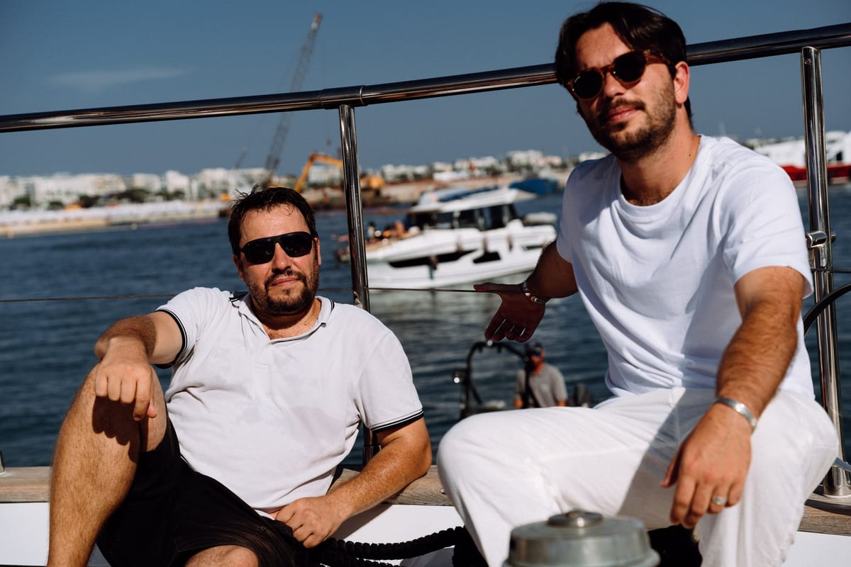 Two members of the crew on deck