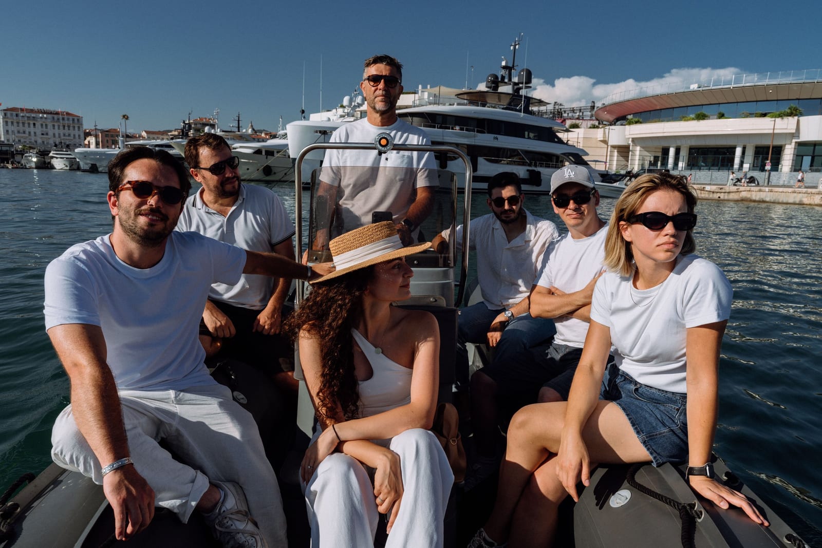 The team aboard a tender in Cannes